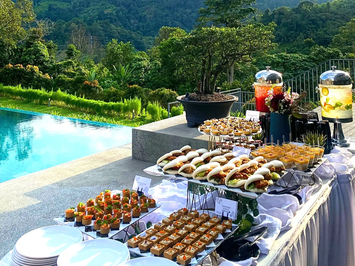 Outdoor wedding buffet setup with scenic mountain backdrop in Selangor by Teaffani Catering